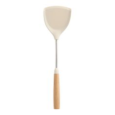 a white spatula with wooden handle on a white background