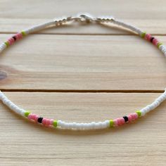 The Watermelon Sugar Dainty anklet is the splash of color and fun that everyone needs in their life. This anklet's vibrant colors can serve as a reminder to treat people with kindness ;) All anklets are customizable to the size you need so please be sure to measure your ankle where you want your anklet to sit and order accordingly! This high quality beaded anklet is secured with a sterling silver lobster claw and made with glass beads that can stand the test of time, making it perfect for everyd Trendy Anklets With Round Beads For Festivals, Trendy Beach Anklets With Tiny Beads, Pink Tiny Beads Anklets For Summer, Pink Anklets With Tiny Beads For Summer, Bohemian Pink Anklets With Round Beads, White Trendy Anklets For Summer, Trendy White Summer Anklets, White Beaded Anklets For Summer, Handmade White Anklets For Summer