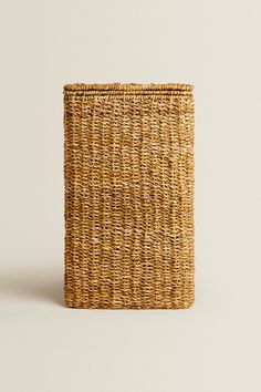 an empty wicker basket on a white background