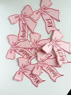 pink bows with happy birthday written on them are arranged in the shape of a bouquet