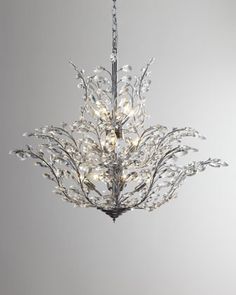 a crystal chandelier hanging from a ceiling