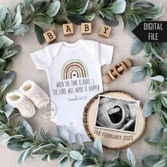 a baby announcement with an elephant's eye and the word baby spelled in scrabble