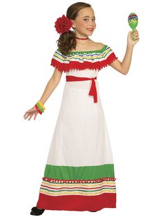 a woman in a mexican dress holding a lollipop and a pincush