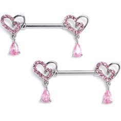 Product Details14 Gauge 9/16 Pink CZ Gem Asymmetrical Heart Dangle Nipple Ring Set Keep style on your side when you fall in love with this 14 gauge nipple jewelry. It is made with 14mm durable 316L surgical grade stainless steel straight barbells. Each of the ends features a heart charm, with one side paved with pink cubic zirconia gems while the other side is unadorned for simple, asymmetrical style, and there is a pink cubic zirconia gem dangle for added motion. Get ready to love these opulent Pink Heart Shaped Body Jewelry For Gift, Adjustable Silver Heart Body Jewelry, Pink Heart-shaped Body Jewelry For Gift, Pink Heart Body Jewelry For Gift, Pink Heart-shaped Body Jewelry For Valentine's Day, Pink Body Jewelry For Valentine's Day Gift, Piercing Rings, Asymmetrical Style, Piercing Ring