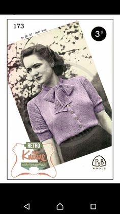 an old photo of a woman wearing a purple sweater