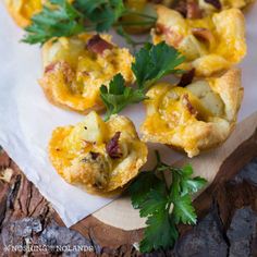 some food is laying on top of a piece of paper and garnished with parsley