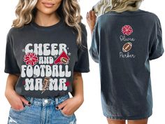 Show your pride on game day with our custom cheer and football mama shirt, featuring a pom pom, megaphone, and football on the front and personalized with the cheerleader and football players names on the back. This is the perfect gift for any mom of both football and cheerleading. COMFORT COLORS 1717 SHIRT: Unisex 100% US cotton - ethically grown and harvested Pre-Shrunk Fabric Relaxed Fit - Size up for a trendy oversized look Seamless Sides Double Needle Stitching Garment-dyed  CARE INSTRUCTIONS: Wash inside out with cold water Tumble dry on low heat Do not bleach Do not dry clean Do not iron directly on the design Experience premium quality with our designs, printed using the state-of-the-art direct-to-garment (DTG) process. Our fabric-grade ink seamlessly blends with garment fibers, de Cheer Mom Shirt, Shirt Names, Sports Mom Gifts, Cheer Shirt