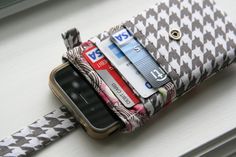 a cell phone is sitting in a wallet