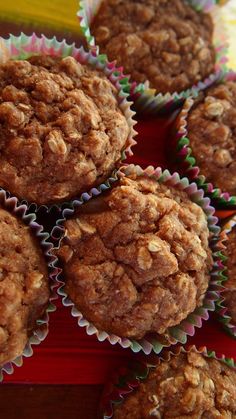 a bunch of muffins sitting on top of a red tray