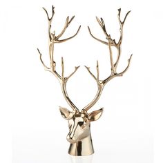 a gold deer head with antlers on it