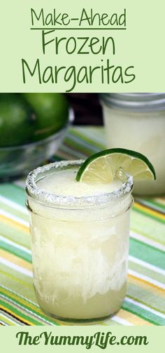 a close up of a margarita in a glass with lime on the rim and text overlay that reads make - ahead frozen margaritas