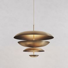 three circular lights hanging from the ceiling