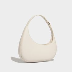 Go out in style with the Evelyn Moon Shoulder Bag, an exquisite underarm bag with a unique sailboat-inspired silhouette. Its sleek and irregular-shaped design exudes high-end fashion, making it a standout piece for any wardrobe. Its versatile structure fits all your essentials while effortlessly elevating your look. Treat yourself to this elegant and functional masterpiece! Now available in brown, black, khaki, and ivory. Elegant Summer Hobo Bag, Elegant Everyday Summer Baguette Bag, Chic Structured Beige Shoulder Bag, Modern Summer Formal Shoulder Bag, Modern Formal Summer Shoulder Bag, Elegant Summer Baguette Bag For Everyday Use, Elegant Summer Baguette Bag, Minimalist Evening Hobo Bag, Trendy Structured Shoulder Bag For Daily Use