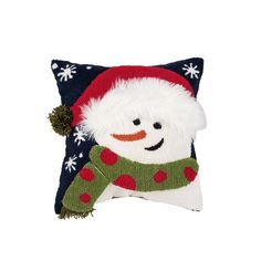 a snowman pillow with a hat and scarf on it