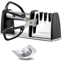 a knife sharpener with several blades on it