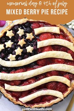 an american flag pie with strawberries and blueberries in it