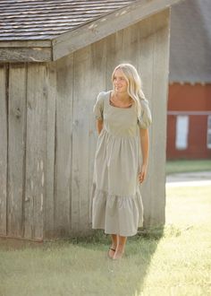 With a joyous style and modest fit, the Ava Square Neck Midi Dress creates a timeless midi dress that can go from day to night in a snap. We love the tiered skirt + the combination of the square neck and puff sleeves! A zipper on the side ensures she is easy to get on and off and sit perfectly across the bust. You are sure to love this clean + classic looking dress! Style: Midi, Short Sleeves SIZING TIPS Fit | Semi-Fitted Stretch | None Models | True to Size Square Neck Midi Dress, Modest Fits, Professional Wardrobe, Church Dresses, Back To School Shopping, Heritage Collection, The Square, Fall Collections, Tiered Skirt