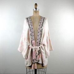 Anthropologie L All Beautiful Stories Livia Textured Handmade Tassel Kimono Wrap Jacket. Fits Approximately : One Size Fits Most; Label States All - Oversized Fit. Bust : Open Waist : Adjustable With Self Sash Length : 29” Nwt. Excellent Condition. Never Worn. 0330 New To Poshmark? Use Code "Shesabettie" For $10 Off Your First Purchase! Bohemian Kimono With Tassels For Beach Cover-up, Bohemian Beach Cover-up Kimono With Tassels, Multicolor V-neck Kimono For Loungewear, Pink Bohemian V-neck Kimono, Multicolor Cotton V-neck Kimono, Anthropologie Jacket, Kimono Wrap, Jacket Fits, Wrap Jacket