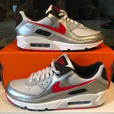 Brand New Air Max 90s. These Shoes Are Red And Silver Color Way. Size 8.5 Men. Awesome Colorway, Never Worn. Perfect For A Loved One. Shipped Out Next Day ! Box Not Included Questions Silver Synthetic Sneakers With Air Max Cushioning, Nike Metallic Sneakers For Sports, Silver Low-top Running Shoes With Air Max Cushioning, Silver Low-top Running Shoes With Air Cushioning, Nike Metallic Silver Sneakers For Sports, Nike Sporty Metallic Silver Sneakers, Bullet Icon, Air Max 90s, Red And Silver