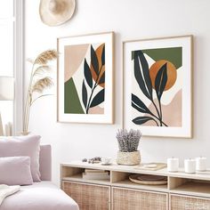 two framed art pieces in a living room