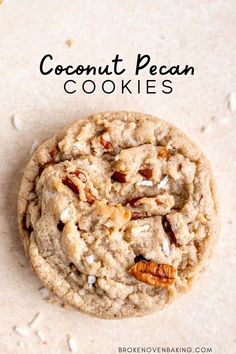 a close up of a cookie with pecans on top and the words coconut pecan cookies above it