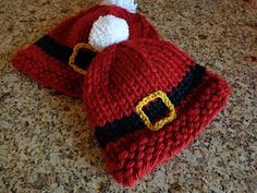 a knitted santa hat laying on top of a counter