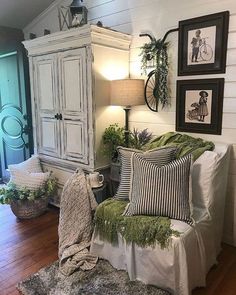 a bedroom with white walls and wood flooring is decorated in an old fashion style