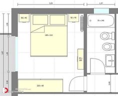 a floor plan for a bedroom with two beds and a bathroom in the middle one