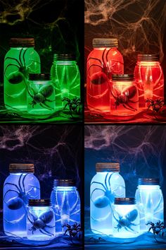 four different colored jars filled with water and spider's in them, all lit up