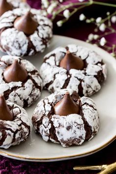 chocolate covered cookies on a white plate