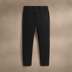 Our Golf Trouser is made in a high performance stretch cotton blend. Style details include a brushed elastic inside waistband with internal drawcord, belt loops, functional zip fly, side slash pockets, back welt pockets with button closure and side slits on bottom hems. Active fit.Additional Information:• 60% Cotton, 26% Nylon, 14% Elastane • Machine wash cold, do not bleach, line dry Classic Black Pants With Hidden Pockets, Sporty 4-way Stretch Pants For Golf, Black 4-way Stretch Training Pants, Black Elastane Pants With 4-way Stretch, Golf Bottoms With Pockets And 4-way Stretch, Black Pants With 4-way Stretch And 5-inch Inseam, Male Body, Welt Pocket, Stretch Cotton