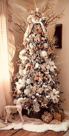 a decorated christmas tree in a living room