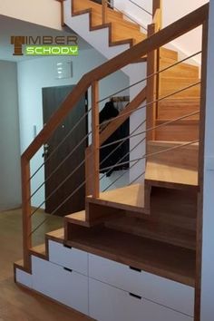 the stairs are made of wood and white