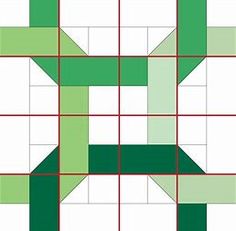 a green and white quilt with squares in the shape of an x on it's center