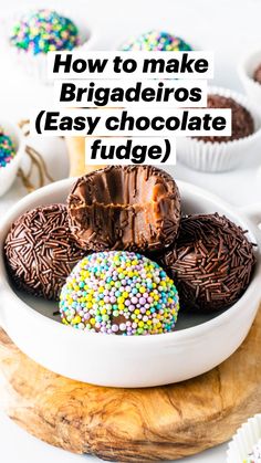 chocolate covered donuts with sprinkles in a white bowl on a wooden platter