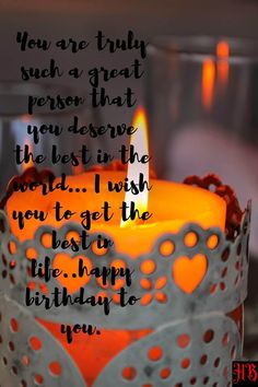 a birthday cake with a lit candle on it and the words, you are truly such a great person that you deserves to be in the best in the world