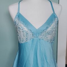 Nwt Size - L Baby Blue Silky Material Adjustable Straps Ties In Back Lace Cups Approximate Measurements Armpit To Armpit - 19" (Untied) Length - 29 1/2" Blue Sleeveless Camisole For Pajama Party, Blue Cami Camisole For Daywear, Blue Camisole For Daywear, Blue Sleeveless Sleepwear With Lace Trim, Blue Sleeveless Sleep Camisole, Blue Lace Trim Sleeveless Sleepwear, Blue Lace Trim Camisole, Summer Blue Camisole For Pajama Party, Blue V-neck Camisole For Loungewear