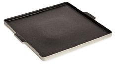 an empty black and white tray on a white background