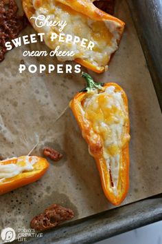 several stuffed peppers on a baking sheet with the words easy sweet pepper cream cheese poppers