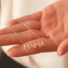 14K Solid Gold Diamond Mama Necklace, Cz Zircon Mama Necklace, Dainty Delicate Plain Gold Mama Necklace is a Great Mother's day Gift for Mom. Material: Solid Gold (no gold filled or no gold plated material) Karat: 14 K (585) Mama Pendant Height: 7 mm (0.28 inches) Mama Pendant Width: 2.5 - 2.60 cm (0.98 - 1.02 inches) Measurements may vary due to handwork. Diamond Mom Necklace >> Diamond Weight: 0,06 - 0,08 ct >> Number of diamonds: 10 >> Diamond Color: G - H color >> Dia Mother's Day Cubic Zirconia Necklace Gift For Her, Mother's Day Gift Cubic Zirconia Necklace, Cubic Zirconia Necklace For Mother's Day, Personalized Cubic Zirconia Necklace For Mom, Mother's Day Gift Cubic Zirconia Jewelry For Mom, Personalized Cubic Zirconia Necklace For Mother's Day, Cubic Zirconia Jewelry For Mom, Elegant Nameplate Necklace For Mother's Day, Mother's Day Anniversary Cubic Zirconia Necklaces