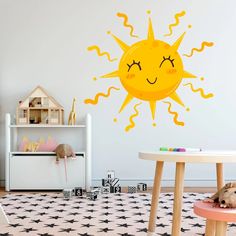 a child's room with a sun wall decal on the wall and floor