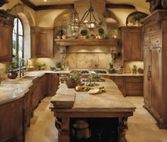 a large kitchen with lots of counter space and wooden cabinetry, along with an island in the middle