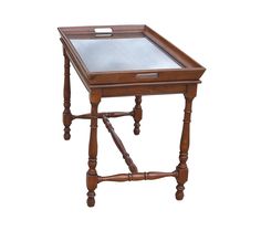 a small wooden table with a glass top