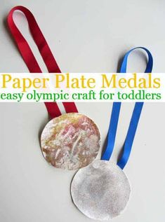 paper plate medals are displayed with red, white and blue ribbons on the bottom one