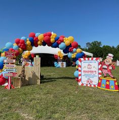 a circus themed birthday party with balloons and signs