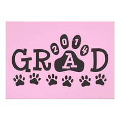 a pink graduation card with paw prints and the word grad in black on it