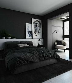 a black and white bedroom with a large bed