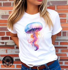 Watercolor Jellyfish T-shirt, Unisex T-shirt, festival tshirt, watercolor Tee, Tshirt art, Jellyfish tee, Animal Tee, Jellyfish tshirt Introducing our Animal T-Shirt, a delightful blend of comfort and style for animal lovers everywhere. Crafted with care, this t-shirt features a captivating animal design that is sure to capture hearts. Each animal is beautifully illustrated, showcasing their unique characteristics and charm. Made from soft, breathable fabric, this t-shirt offers a cozy fit that Artistic White Summer T-shirt, Summer Tie Dye T-shirt With Funny Print, White Watercolor Print Short Sleeve T-shirt, Casual White T-shirt With Watercolor Print, Artistic Sublimation Print T-shirt For Summer, Summer Graphic Tee With Watercolor Print, Tie Dye T-shirt With Sublimation Print For Summer, Summer Watercolor Print Short Sleeve T-shirt, Summer Short Sleeve T-shirt With Watercolor Print