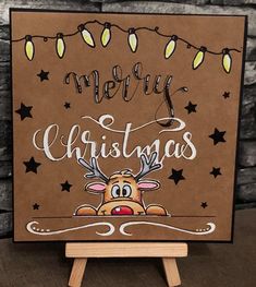 a handmade christmas card with a reindeer on it's head and the words merry christmas