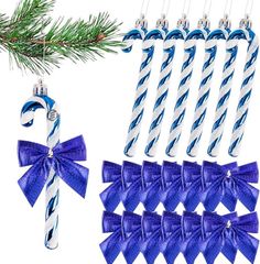 blue and white candy canes hanging from a christmas tree